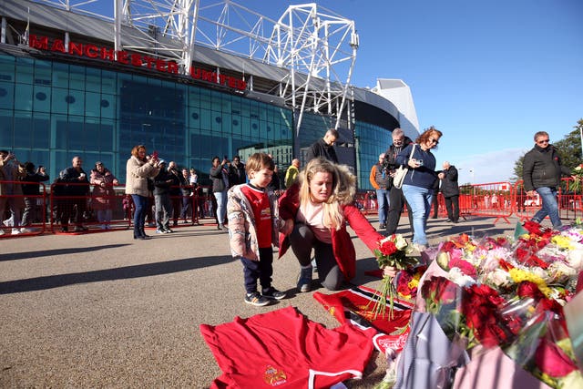 Tributes are laid in memory of Sir Bobby Charlton outside Old Trafford (Barrington Coombs/PA).