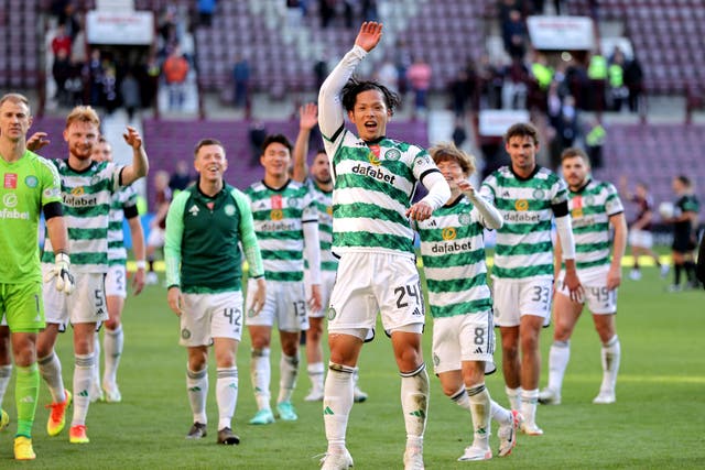 Last goalscorer Tomoki Iwata leads Celtic’s Tynecastle celebrations (Steve Welsh/PA)