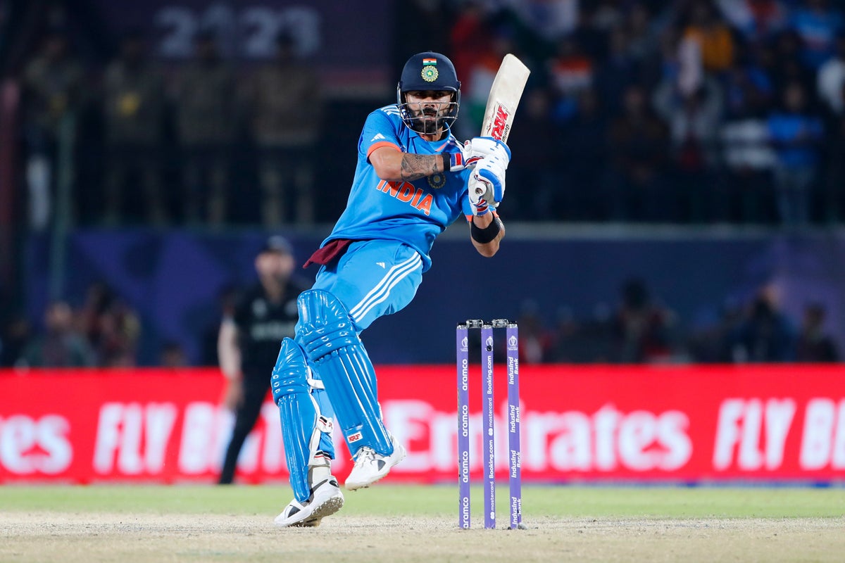 Virat Kohli helps India stay perfect at World Cup – but misses out on historic century