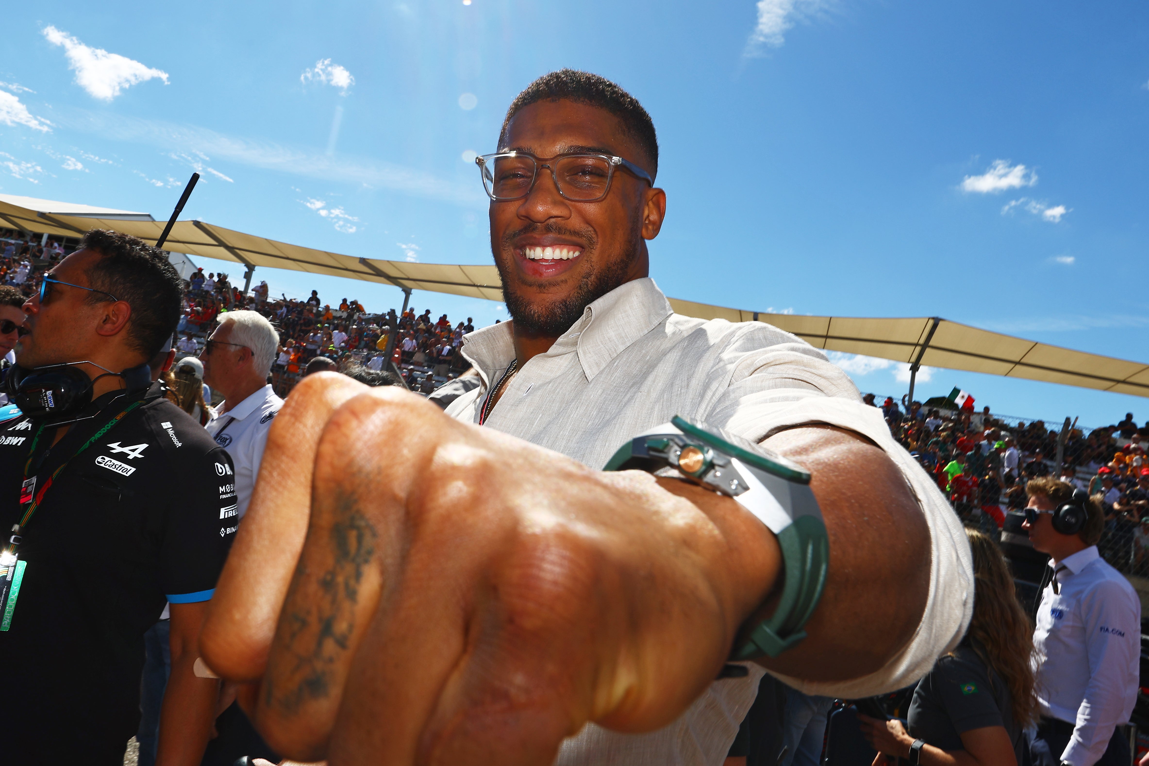 Anthony Joshua poses for a photo on the grid prior to the F1 Grand Prix of United States