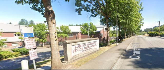 <p>Five masked people entered a side door of Auburn Riverside High School earlier this week </p>