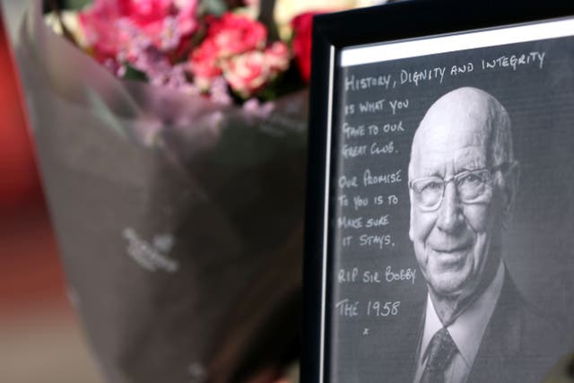 Old Trafford was awash with tributes to Sir Bobby Charlton on Sunday, with a book of condolence opened by the club (Barrington Coombs/PA)