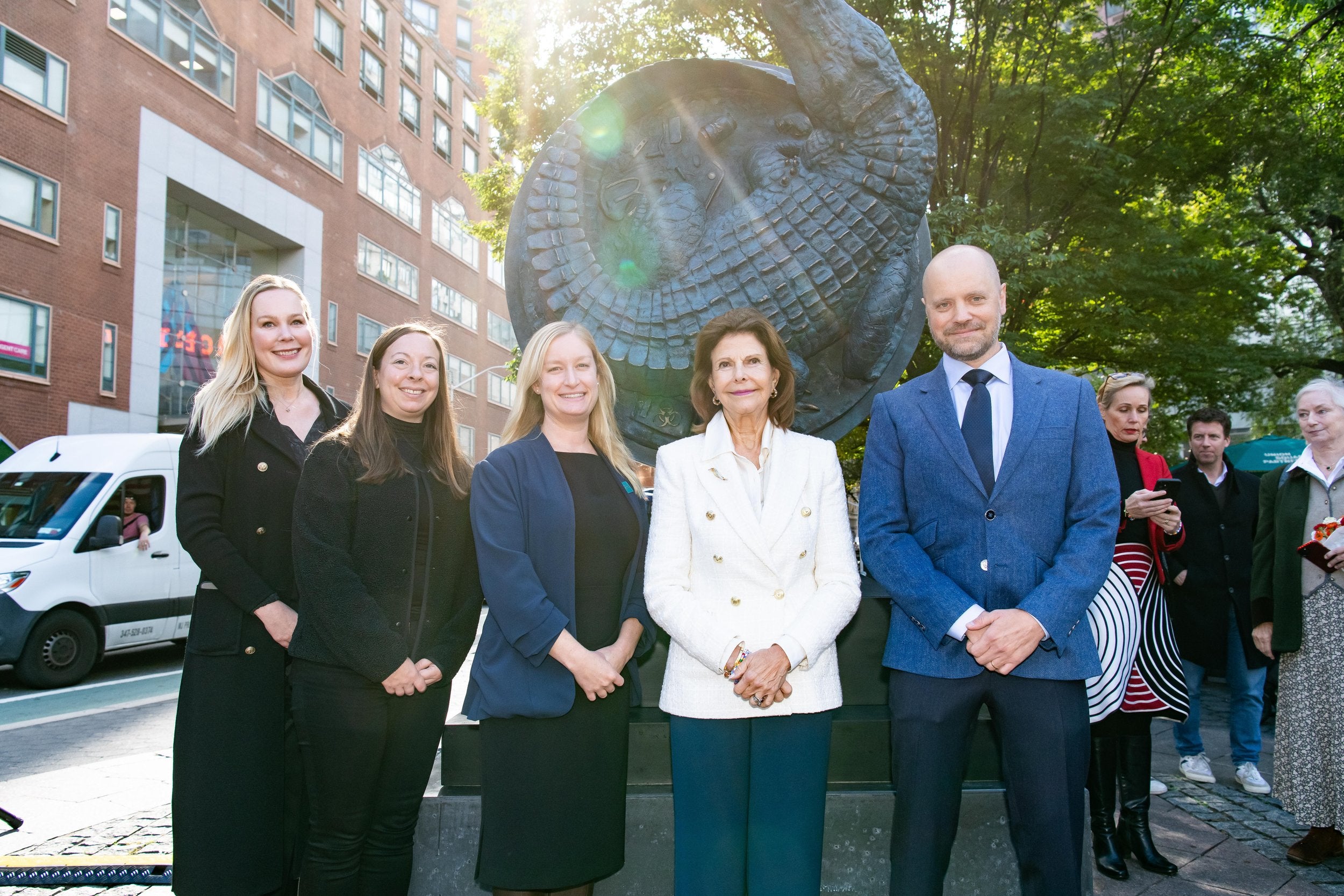 Swedish native Alexander Klingspor on the far right with Queen Silvia of Sweden next to him and NYC parks executives
