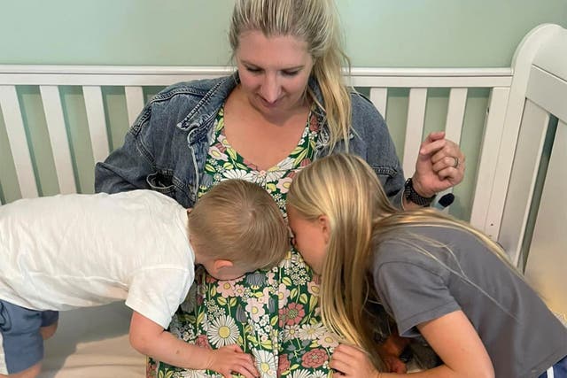 <p>Rebecca Adlington with her two older children before her devastating loss </p>