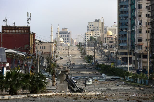 An Israeli bombardment caused damage on al Rashid main Street in Gaza City (AP)