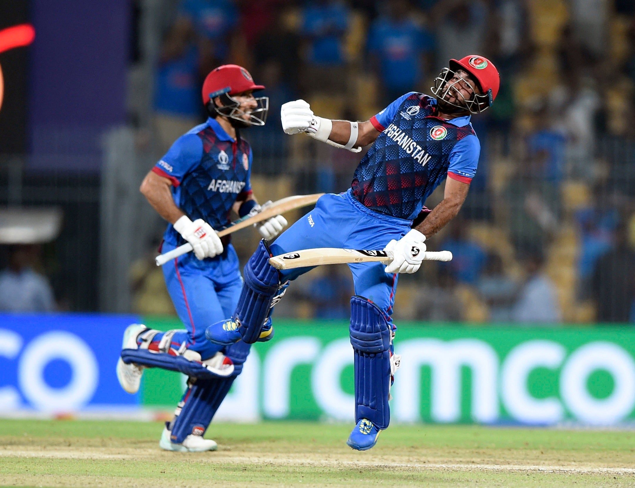 Afghanistan's Rahmat Shah and Hashmatullah Shahidi celebrate after winning the match by 8 wickets