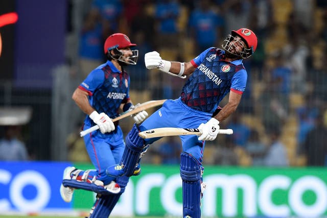 <p>Afghanistan's Rahmat Shah and Hashmatullah Shahidi celebrate after winning the match by 8 wickets</p>
