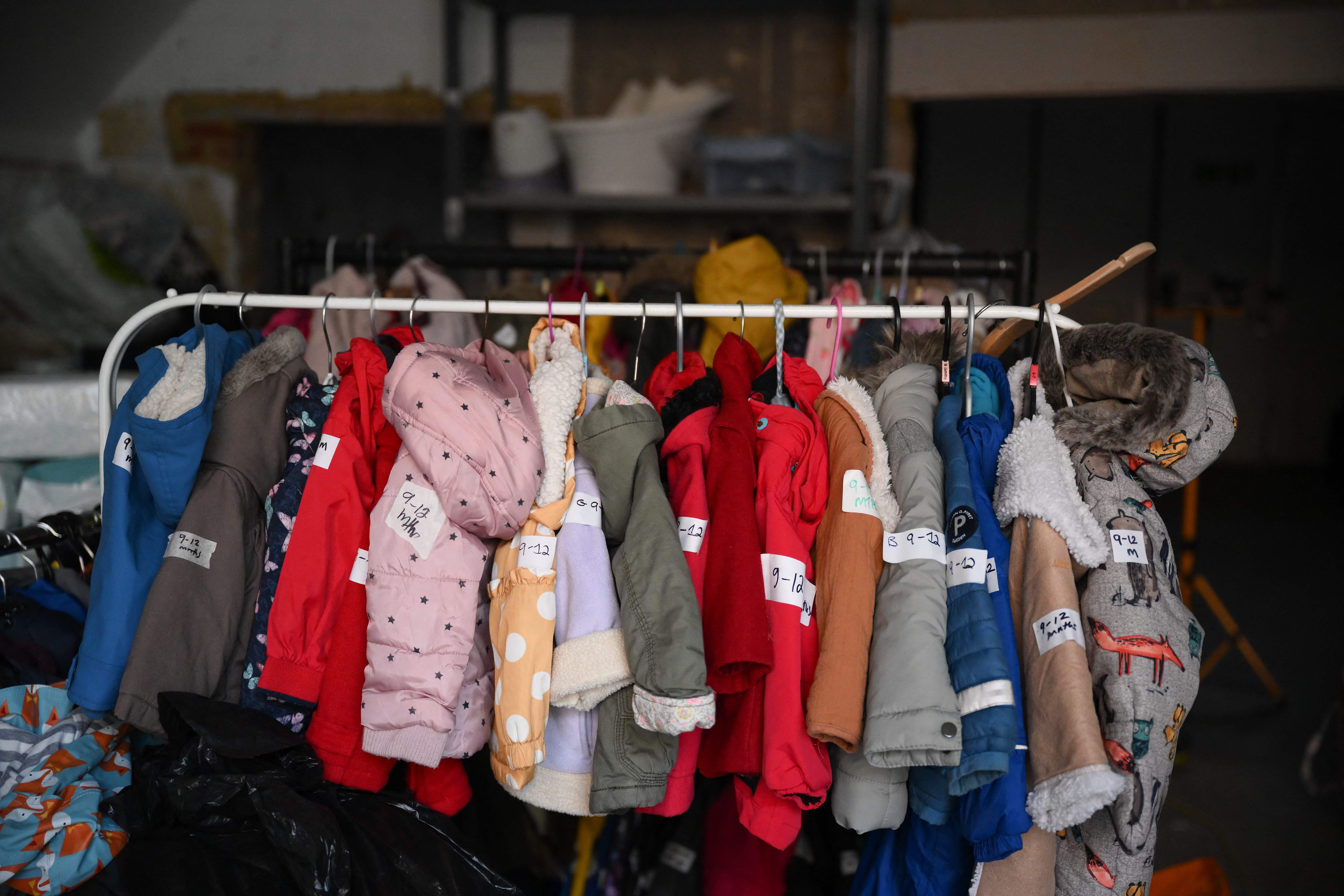 <p>Donated children’s jackets at the Hackney Children & Baby Bank centre, ready to be distributed to support families with young children </p>