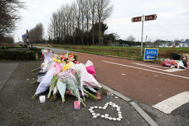 Floral tributes near the Grand Canal in Tullamore after the death of Ashling Murphy (PA)