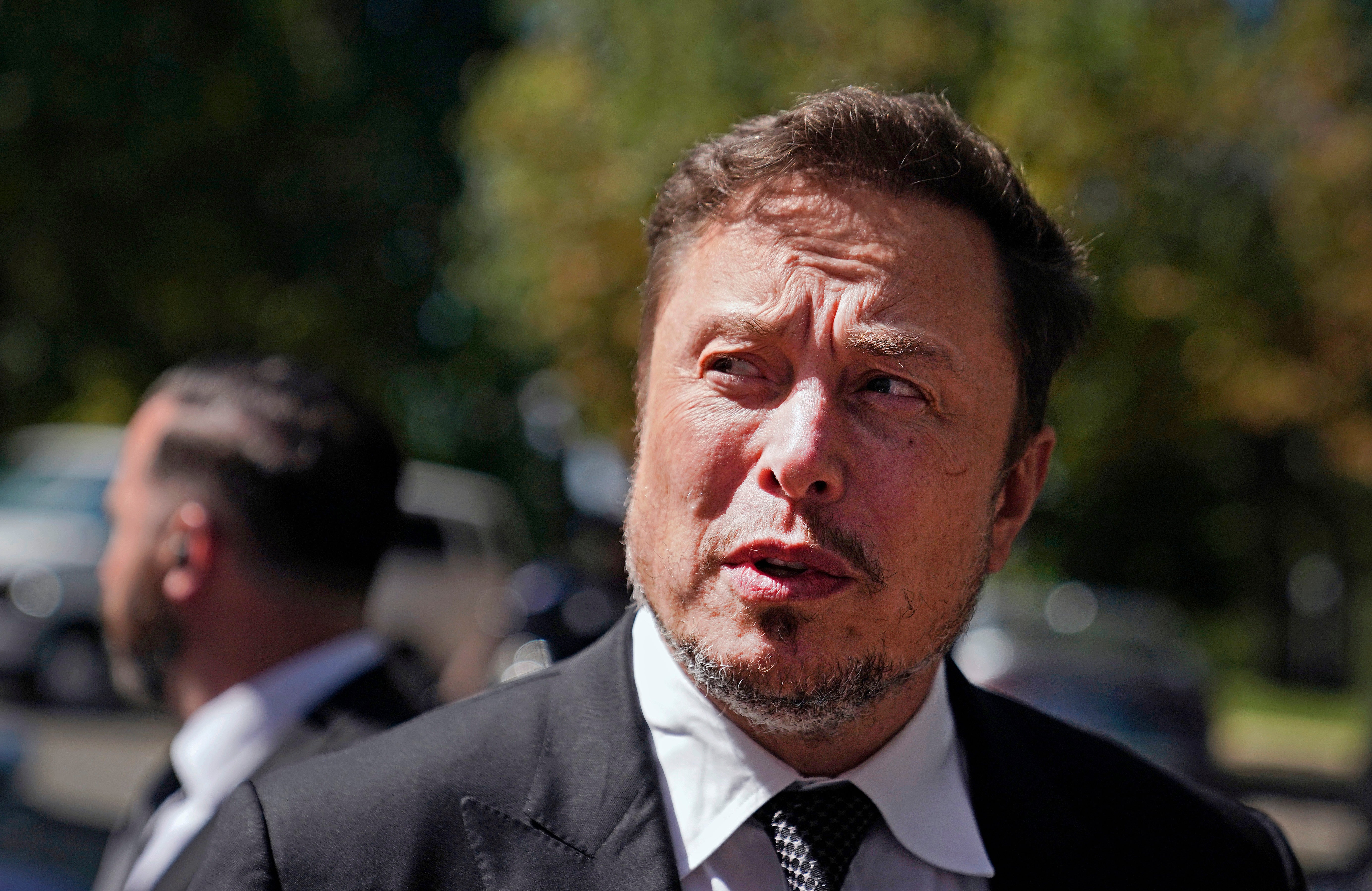 Elon Musk, CEO of Tesla and X, speaks to reporters as he leaves the AI Insight Forum at the Russell Senate Office Building on Capitol Hill on September 13, 2023 in Washington, DC