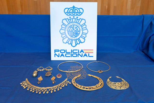 <p>Some pieces of ancient gold artefacts that were stolen from Ukraine are seen in this handout photo released by the Spanish Police after they were seized when the thieves were caught trying to sell them in Madrid</p>