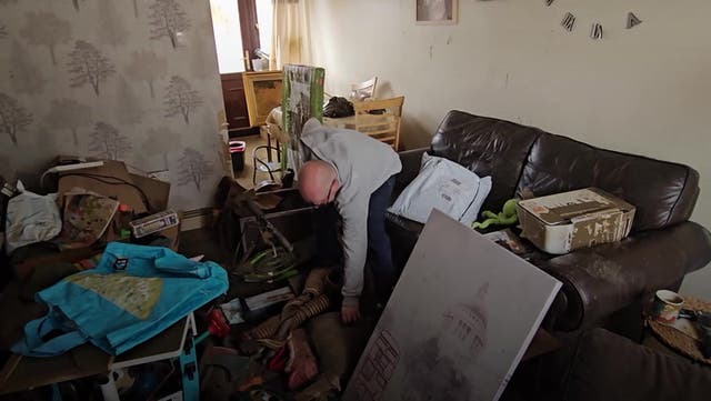 <p>Rotherham residents sort through destroyed belongings after Storm Babet floods houses.</p>