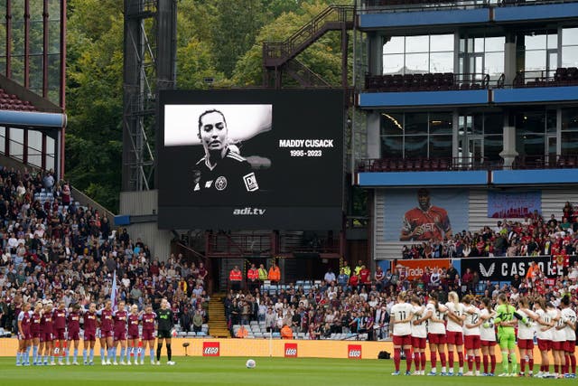 Aston Villa and Manchester United take part in a minutes silence in memory of Maddy Cusack during the Barclays Women’s Super League match at Villa Park (Jacob King/PA)