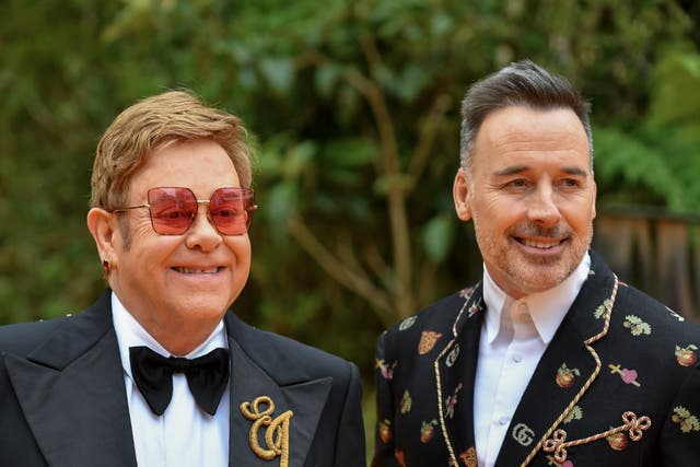 <p>Elton John and David Furnish photographed in 2019 </p>