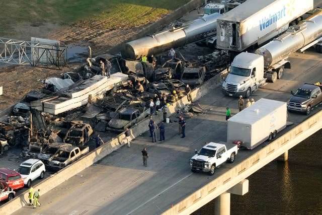 <p>In this aerial photo, responders are seen near wreckage in the aftermath of a multi-vehicle pileup on I-55 in Manchac</p>
