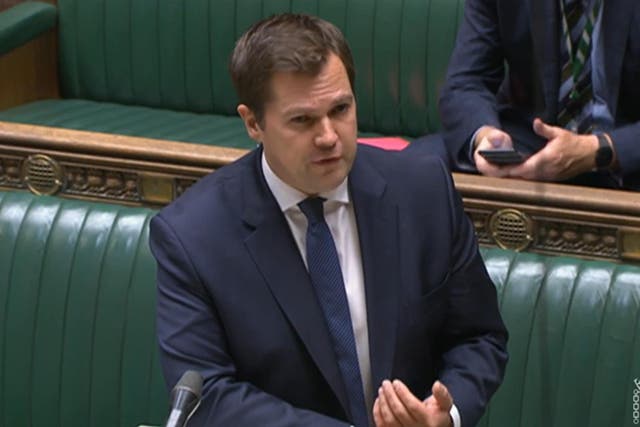 Robert Jenrick made a statement in the Commons on reducing the number of hotels housing asylum seekers (House of Commons/UK Parliament/PA)