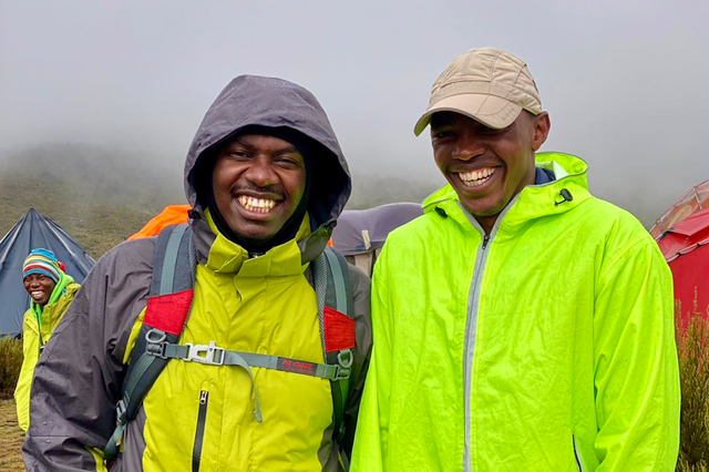 <p>Kelvin Mwithi (right) was a renowned guide in Kenya and leaves behind a wife and young toddler following the incident</p>