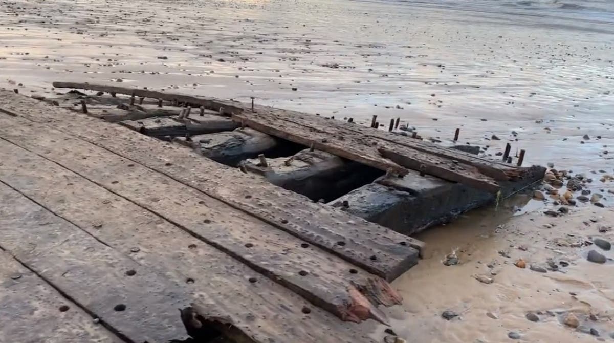 Mystery structure that washed up on beach during Storm Babet ‘could be 200-year-old shipwreck’