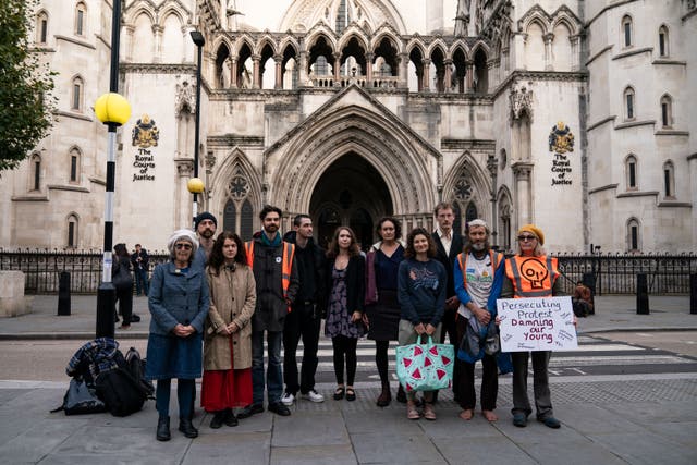 Just Stop Oil protester (left) Gaie Delap with others at the Royal Courts of Justice (Aaron Chown/PA)