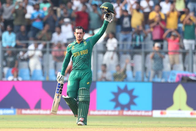 <p>Quinton de Kock of South Africa celebrates after scoring a hundred during the ICC Men's Cricket World Cup 2023 match between South Africa and Bangladesh</p>