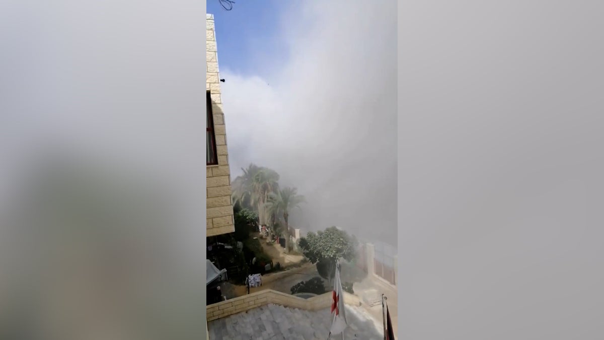 Israel-Hamas: Plumes of smoke surround hospital in Gaza after heavy bombardment