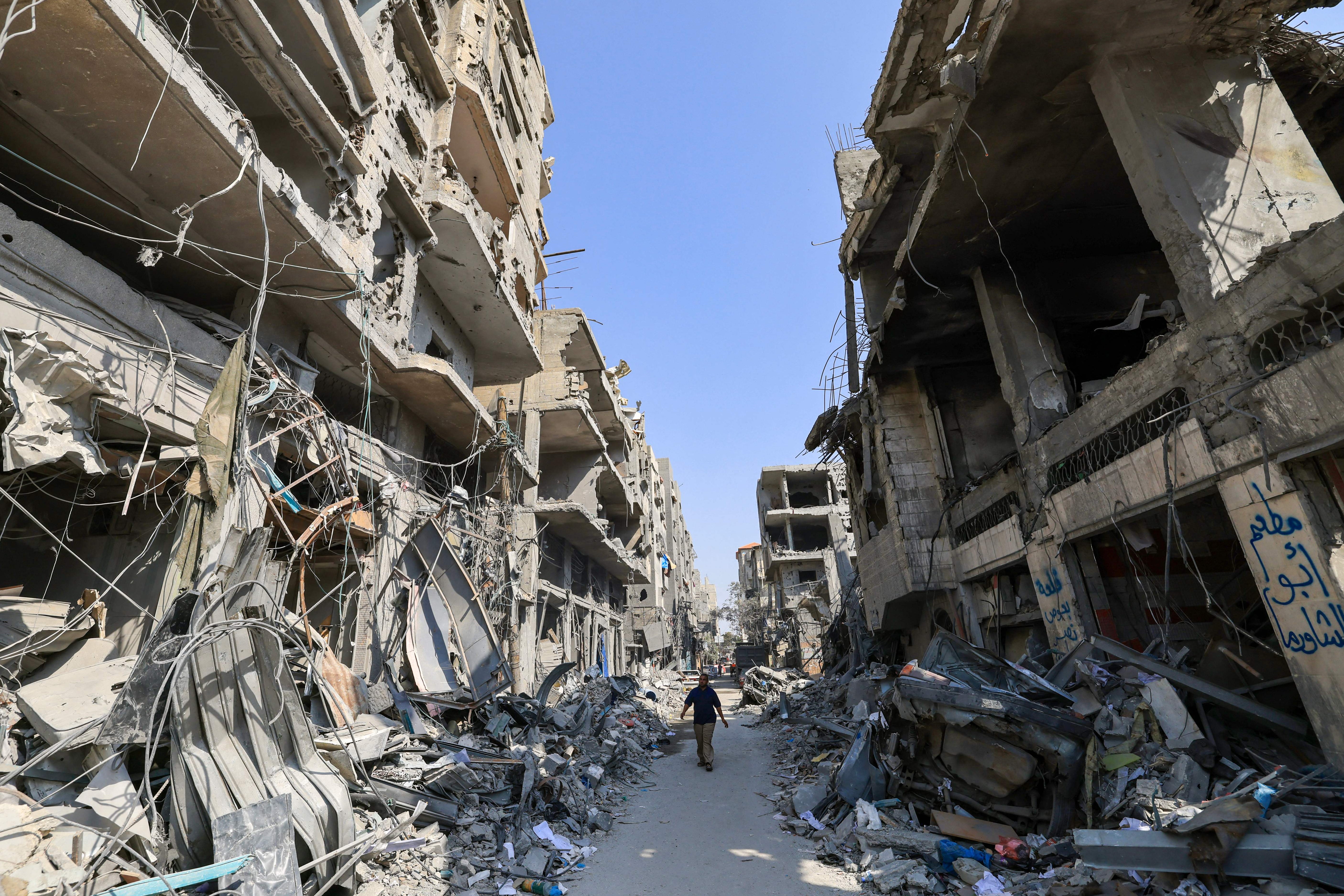 The rubble of buildings hit in Israeli air strikes in Khan Yunis in the southern Gaza Strip