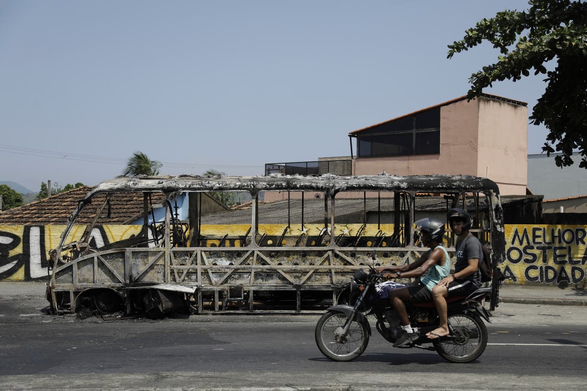 Rio de Janeiro deploys helicopters in extra security after a criminal gang torches 35 buses Rio de Janeiro deploys helicopters in extra security after a criminal gang torches 35 buses