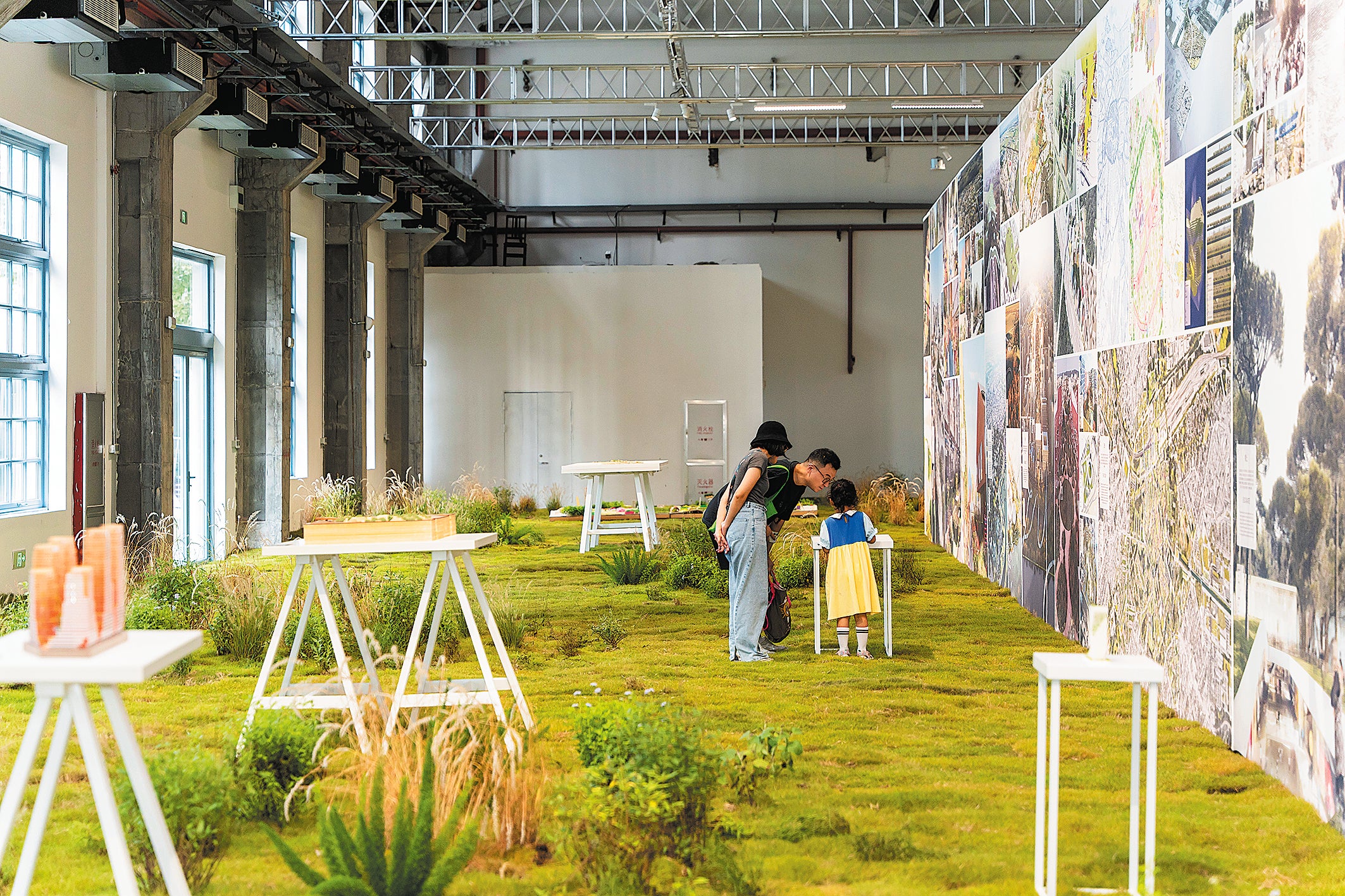 The exhibition hall is covered by greenery