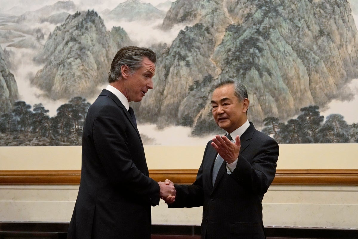 California Gov. Newsom has rare friendly exchange with China’s senior diplomat Wang Yi