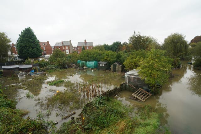 <p>Debris and flood water in allotments in Retford, Nottinghamshire, after Storm Babet passed through the area</p>