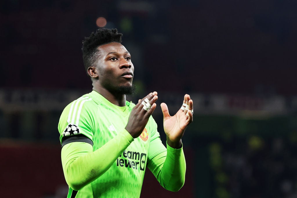 Andre Onana celebrates after saving a penalty from Jordan Larrson and giving Manchester United a 1-0 win over FC Copenhagen