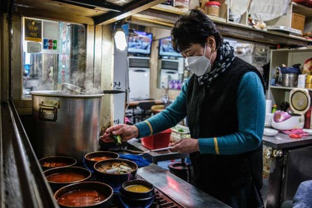<p>Representational image: A cook preparing dish at a restaurant in South Korea</p>
