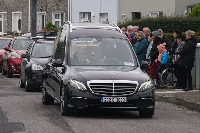 The funeral cortege for Tina Satchwell is driven through her home town of Fermoy (Brian Lawless/PA)