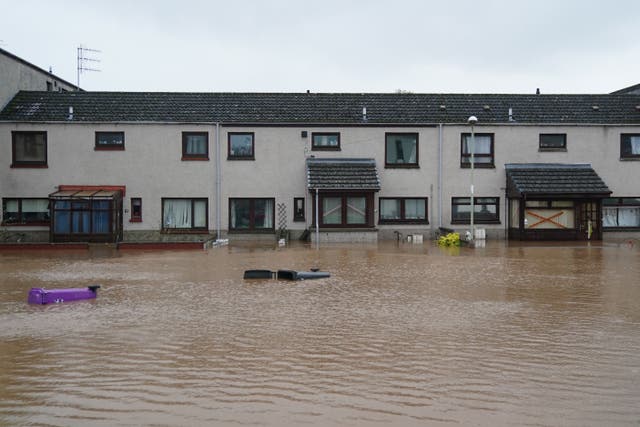 <p>The extreme weather has flooded properties across the UK</p>