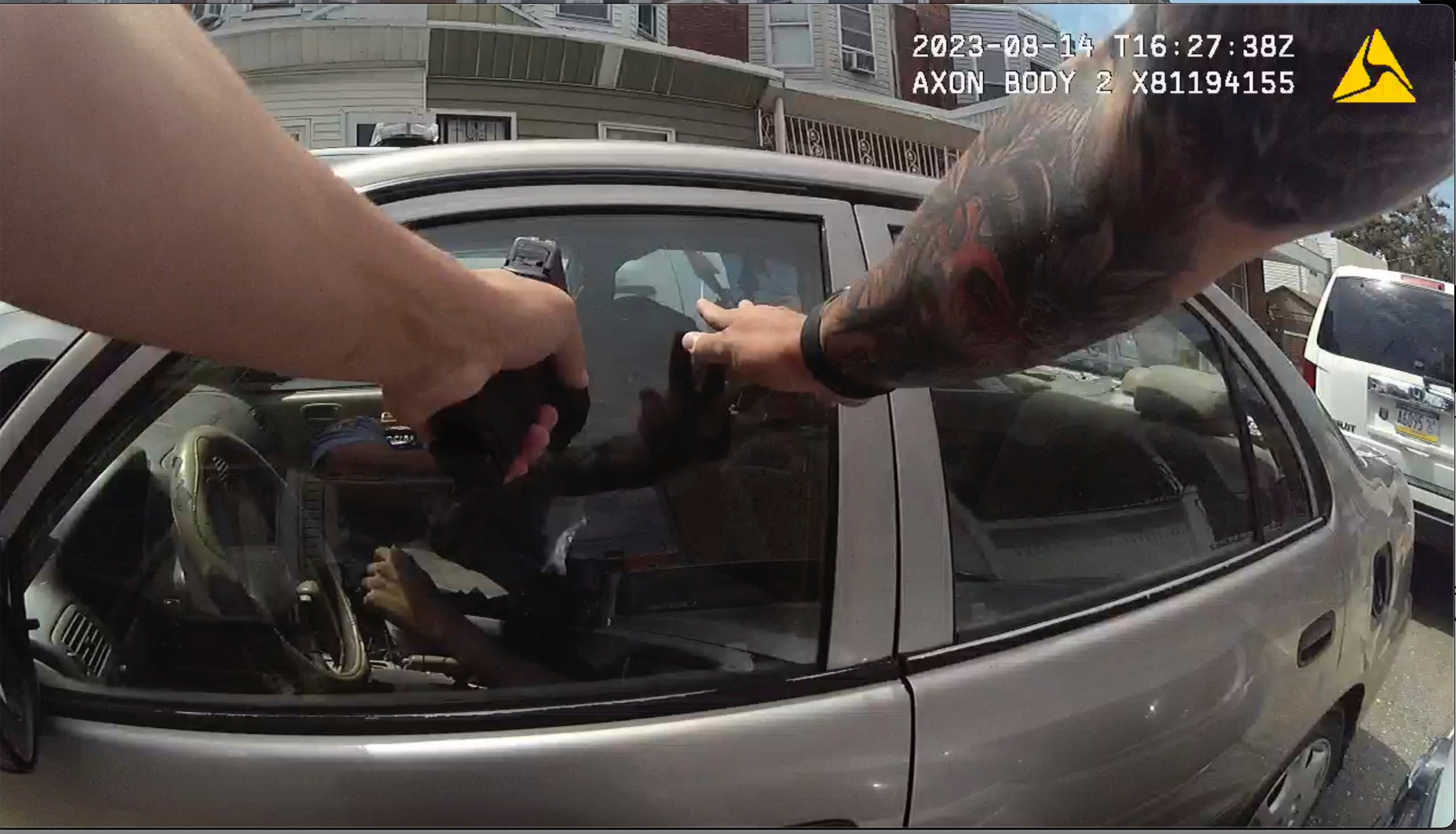 Police body camera video shows Philadelphia police officer Mark Dial with his gun pointed at Eddie Irizarry on August 14, 2023. This week, a judge dropped a murder charge against the officer in the case.