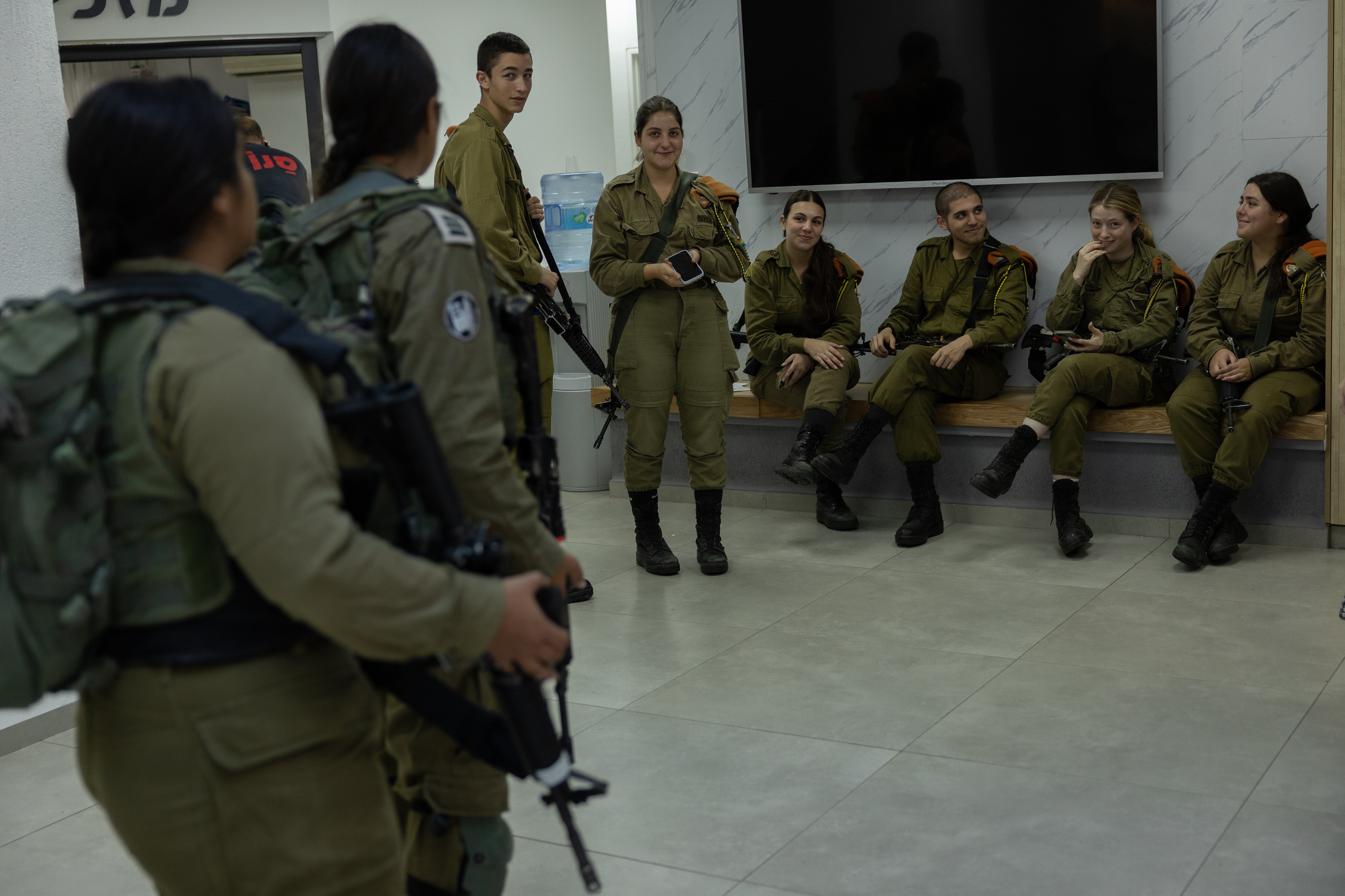 Young Israeli soldiers gather near Lebanon’s border