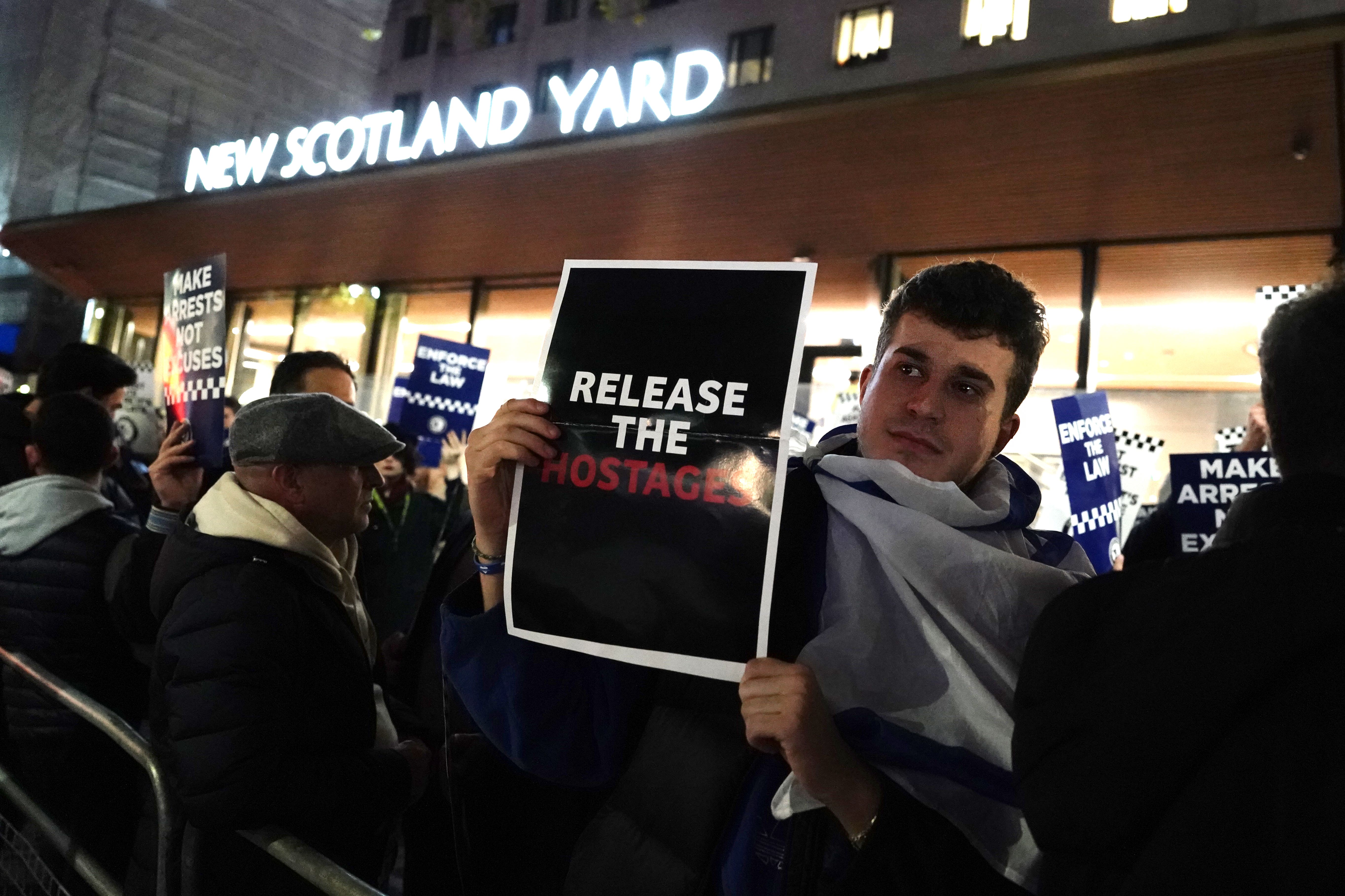 Protesters outside New Scotland Yard (Jordan Pettitt/PA)