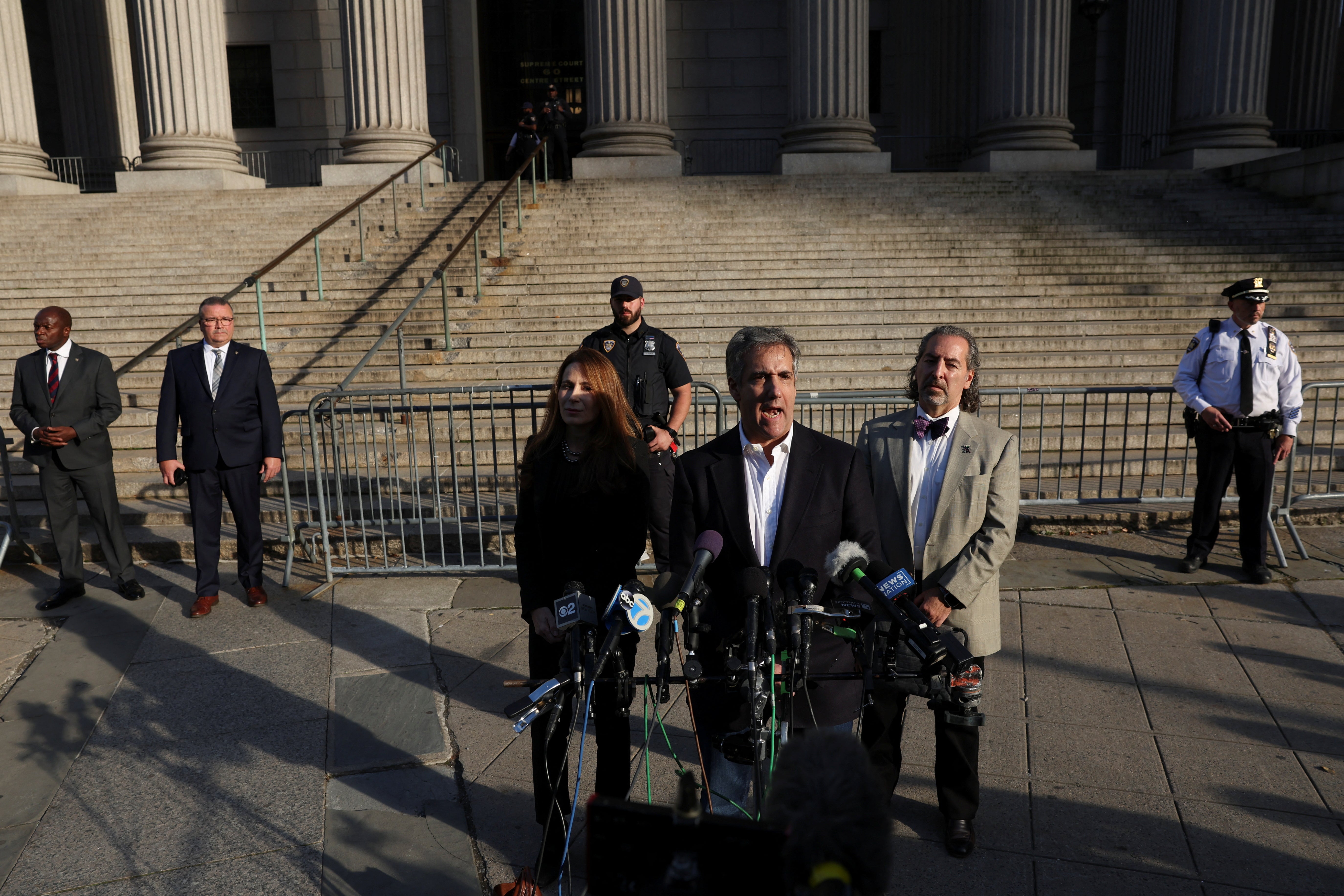 Michael Cohen speaks to reporters after two days of testimony in Donald Trump’s civil fraud trial in New York Supreme Court on 25 October.
