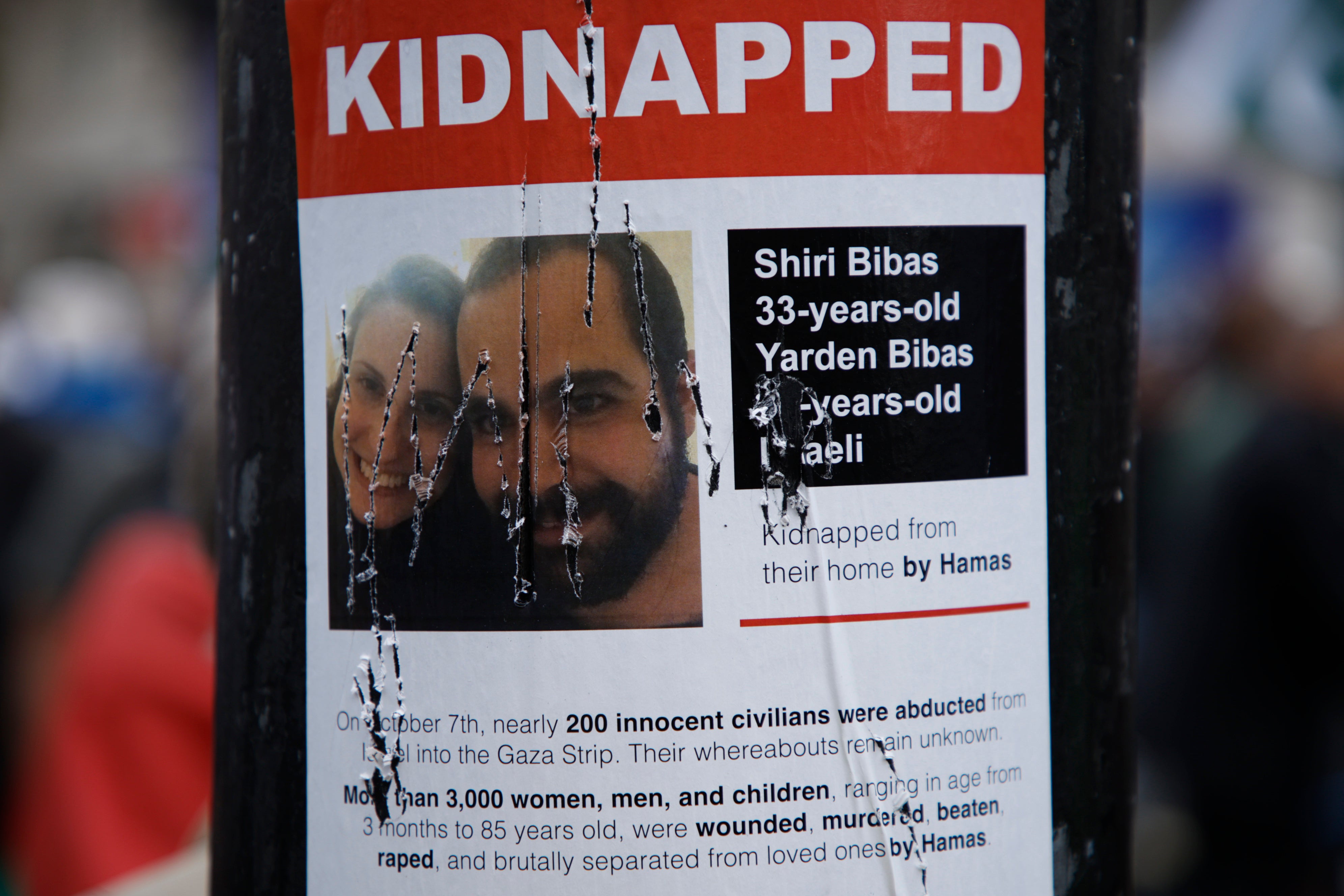 A damaged poster on a lamppost in London after a pro-Palestine protest last weekend