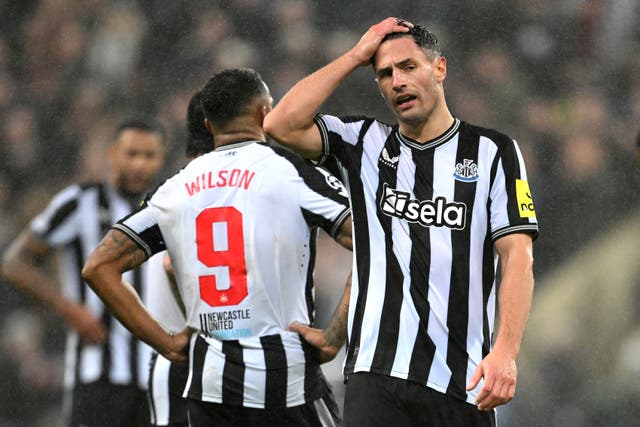 <p>Fabian Schar reacts after Newcastle were unable to find an equaliser </p>