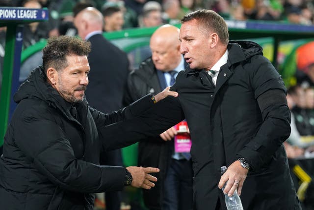 Atletico Madrid manager Diego Simeone greets Celtic manager Brendan Rodgers (Andrew Milligan/PA)
