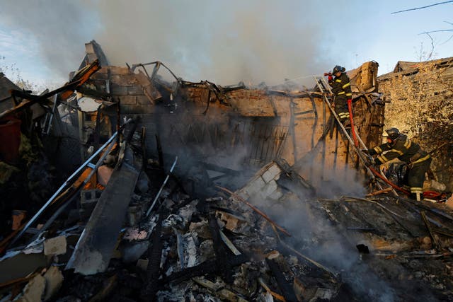 <p>File photo: Firefighters work to put out fire at a house that was hit by shelling in the course of Russia-Ukraine conflict in Donetsk, Russian-controlled Ukraine on 24 October</p>