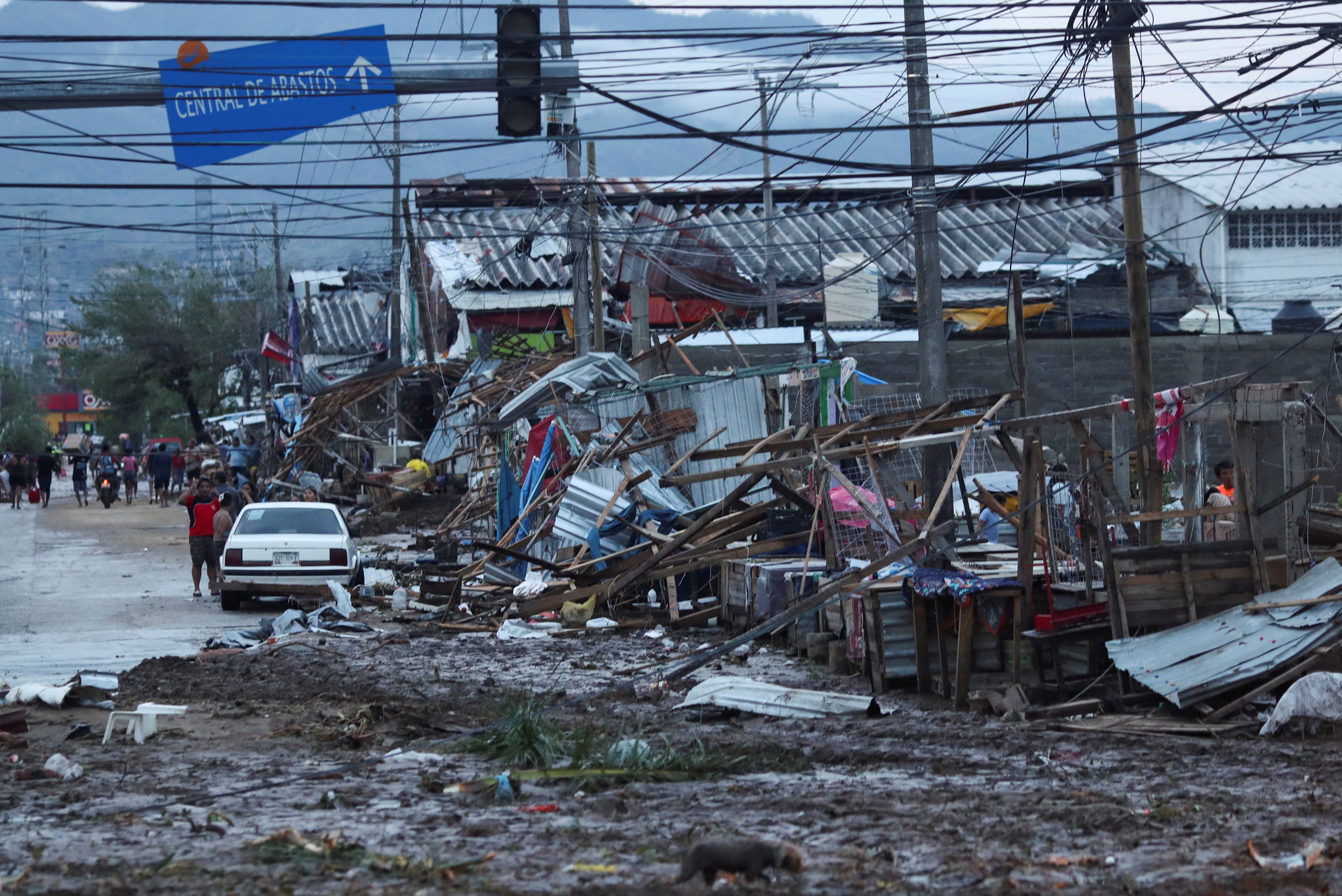 A view shows street stalls damaged by Hurricane Otis near the entrance to Acapulco, in the Mexican state of Guerrero