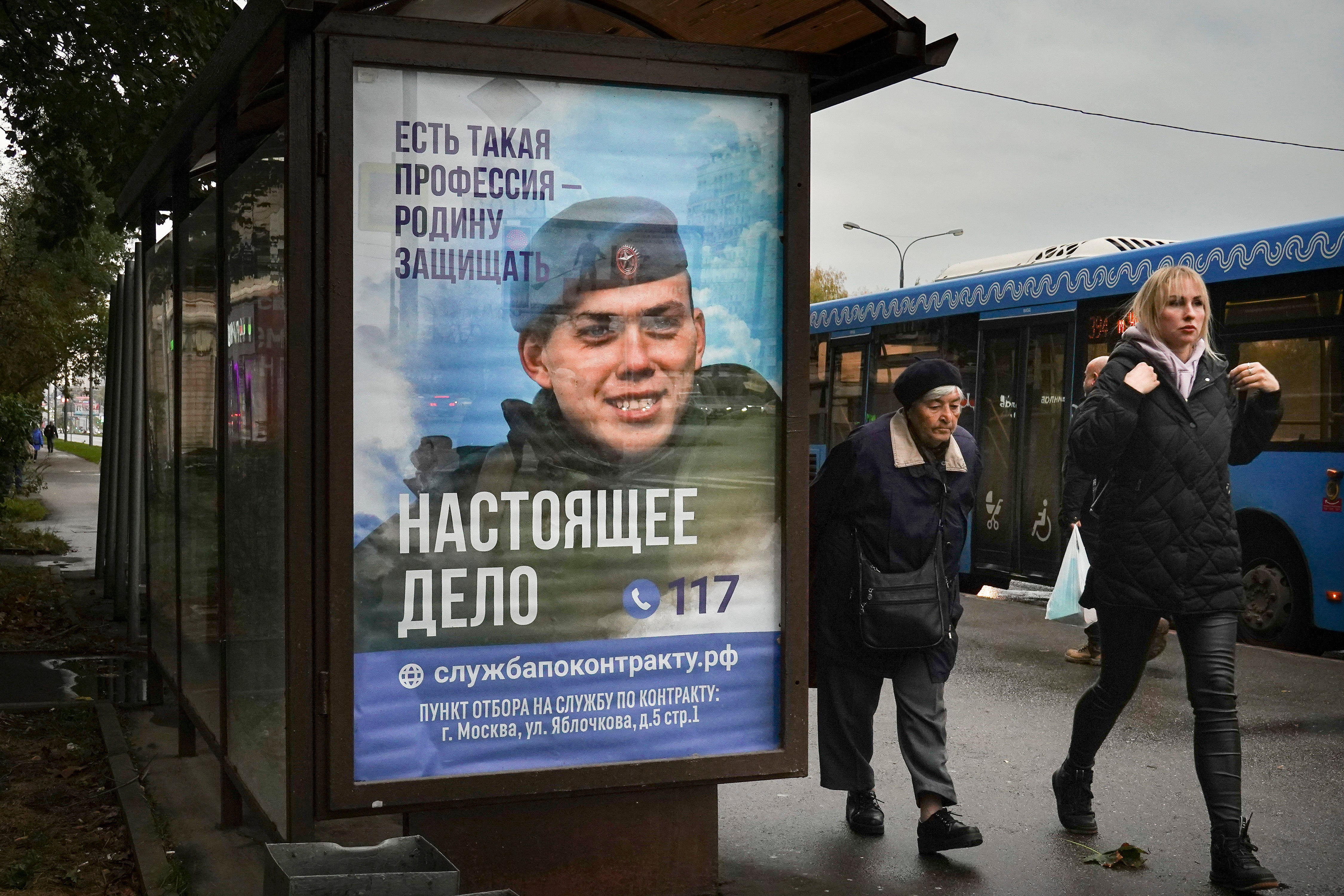 Poster for military conscription shows a Russian soldier with the slogan 'There is such a profession as defending the homeland. The real deal.'