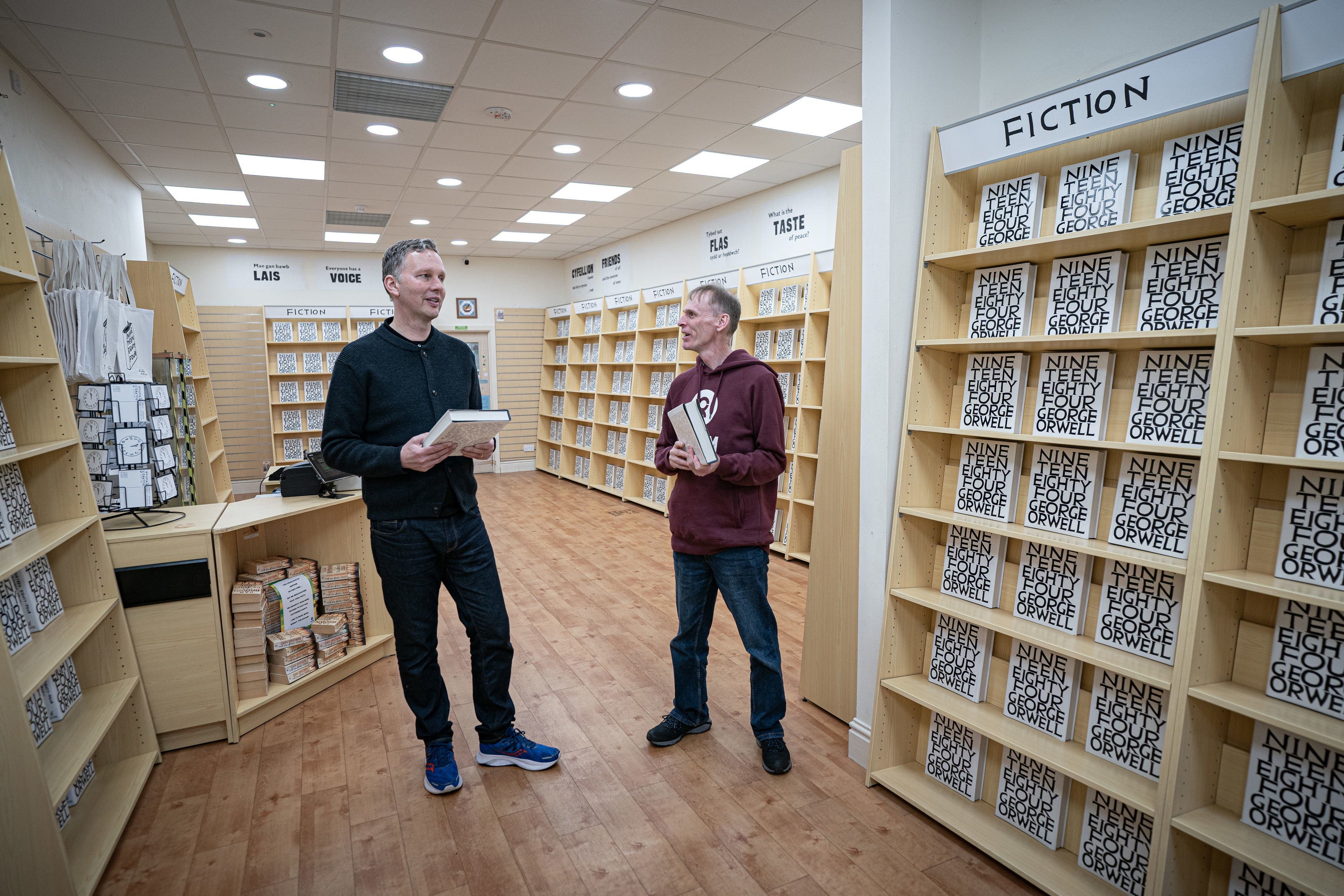 Shrigley in conversation with the manager of the Swansea Oxfam shop where this story began