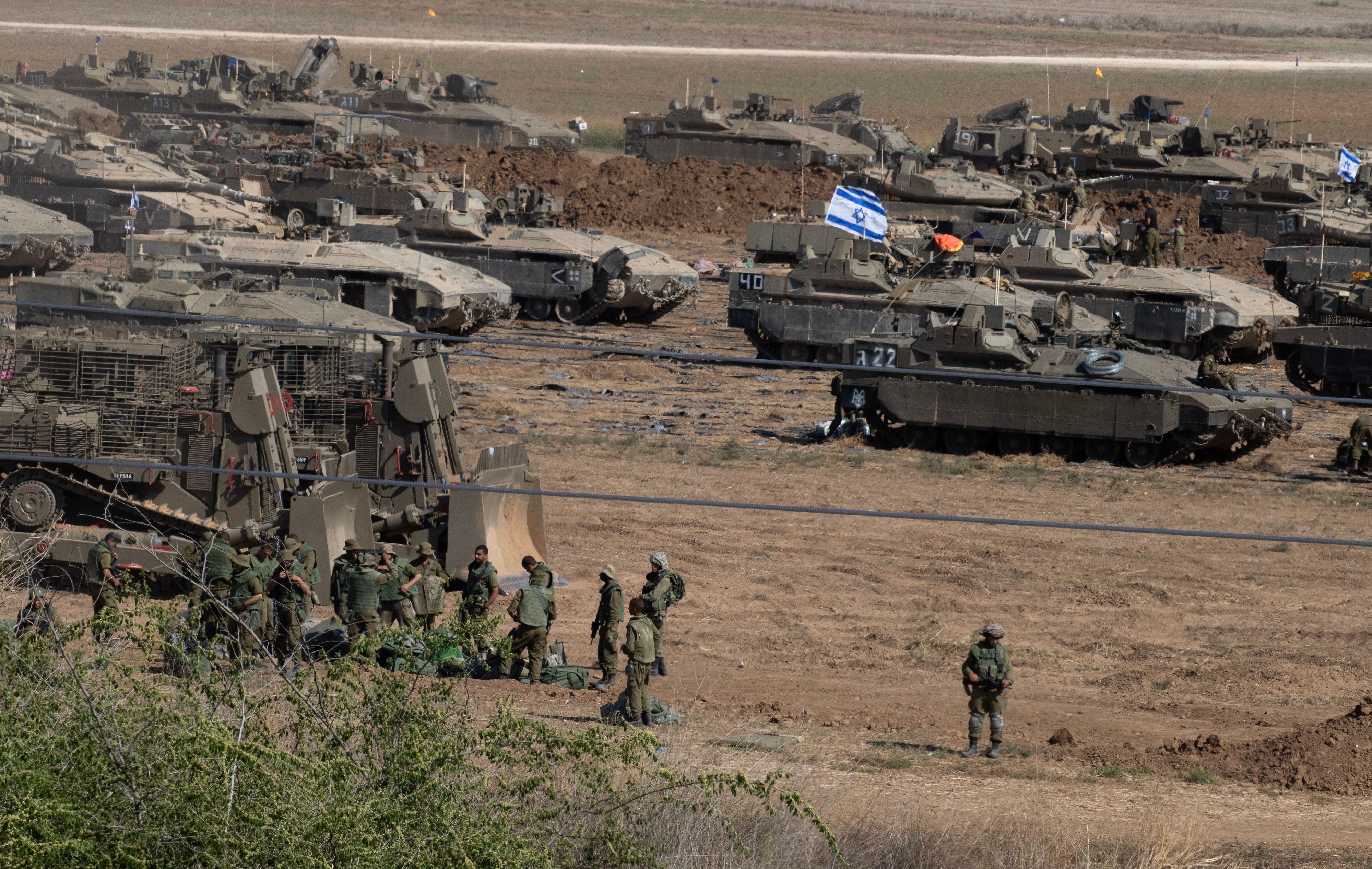 Hundreds of Israeli tanks and bulldozers will be used during a ground offensive in Gaza