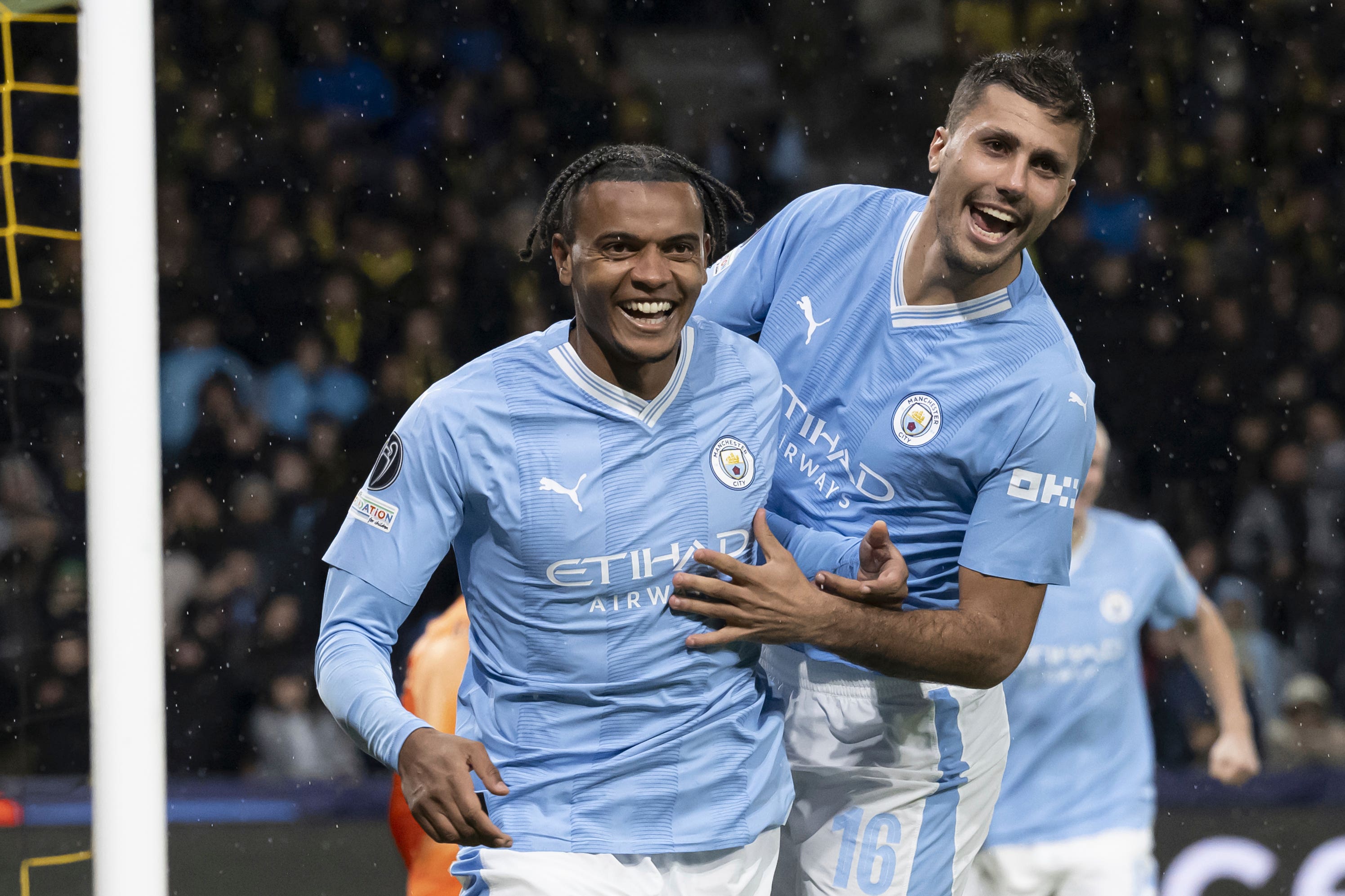 Manuel Akanji, left, celebrates his goal against Young Boys (Anthony Anex/AP)