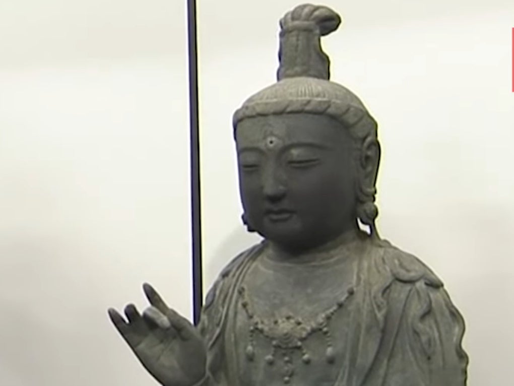 There was a long-standing legal dispute between the two neighbours over the Buddha statue that was stolen from a temple in Japan in 2012