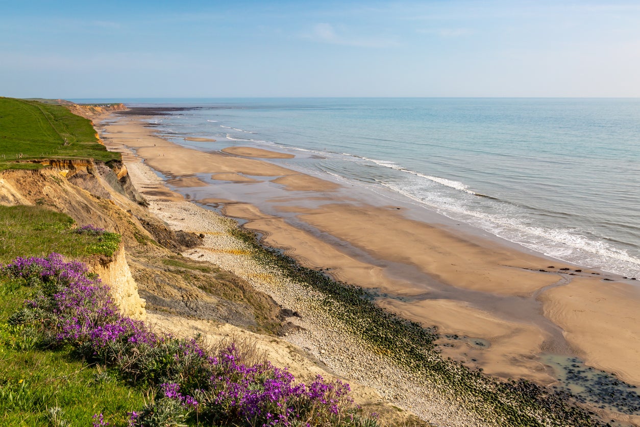 A reliable surf swells on Compton Bay – particularly during the wetsuit-wearing winter months