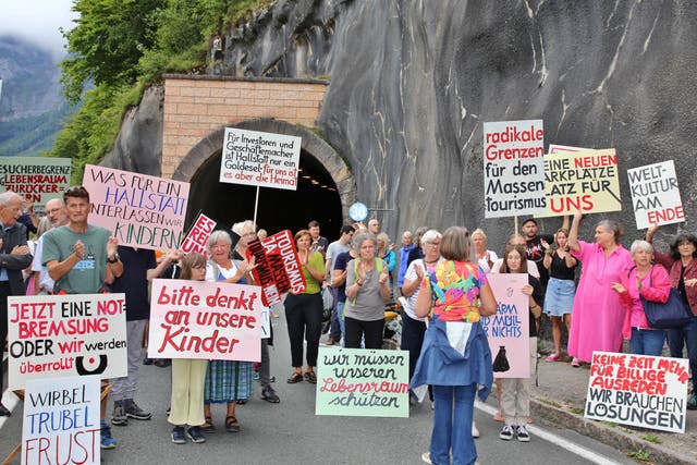 <p>Protestors blocked the road into the town </p>